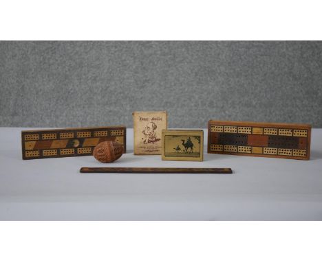 A collection of treen and other items. Including a carved Coquilla nut sewing egg, a Tunbridge ware floral design ruler, two 