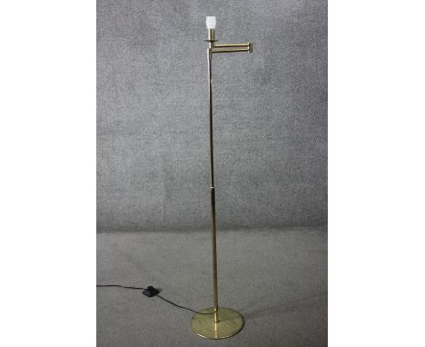 A vintage brass extending standard lamp with hinged articulated arm. H.152 (fully extended) W.28cm. 
