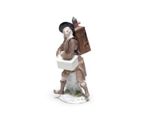 A Meissen Cris de Paris figure with the magic lantern, circa 1755Modelled by P. Reinicke, with a hand organ to his front and 