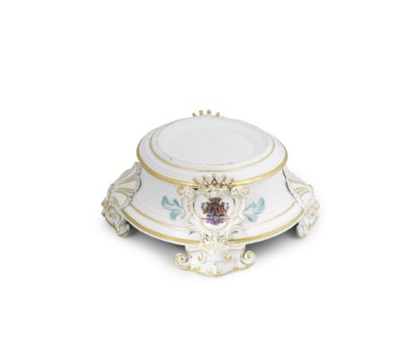 A rare Meissen circular stand from the Sulkowski Service, circa 1735-38Moulded with basketwork and raised on four gilt-edged 