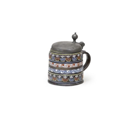 A pewter-mounted Dippoldiswalde stoneware tankard, late 17th centuryDecorated with a narrow Kerbschnitt band heightened in gi