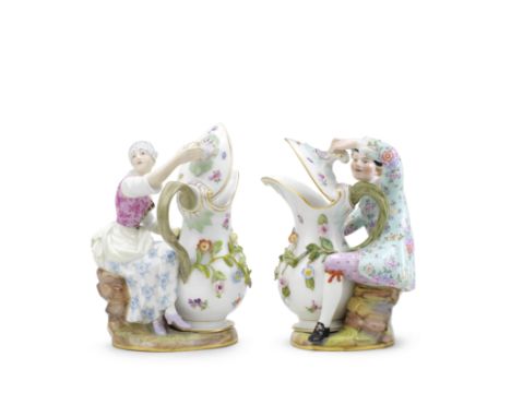 A pair of Meissen figures with jugs, late 19th/early 20th centuryAfter the 18th century models by J.F. Eberlein, both seated 