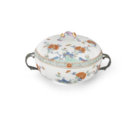 A Meissen silver-mounted lobed ecuelle and cover, circa 1729-31Painted in Kakiemon style with flowering branches of peonies i