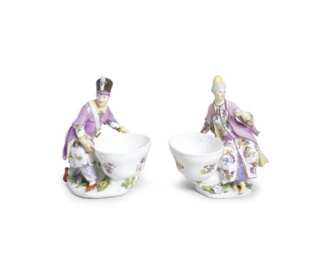 A pair of Meissen figural salts depicting Turks, circa 1745Modelled by J.F. Eberlein, the kneeling gentleman wearing a brown 