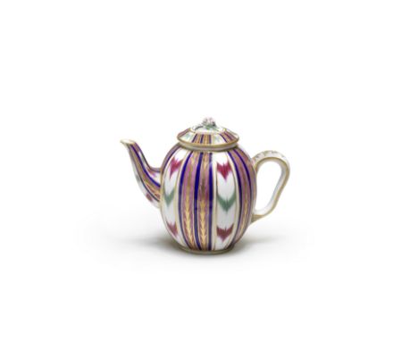 A Sèvres teapot and cover (Théière 'Calabre'), dated 1766Decorated with vertical gilt-edged panels of an ikat textile pattern