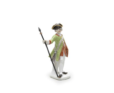 A Meissen figure of a pikeman, mid 18th centuryModelled by J.J. Kaendler, wearing a gilt-edged black tricorn, green jacket wi