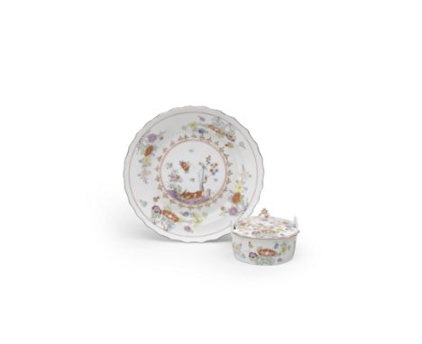 A Meissen butter tub and cover and circular stand, circa 1730The small round tub with upright lug handles, vase-shaped finial