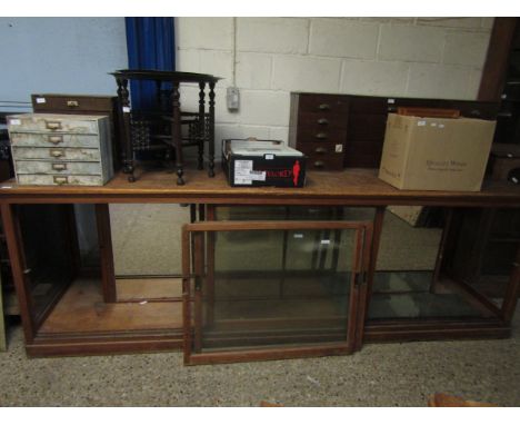 VINTAGE PINE SHOP COUNTER WITH TWO GLASS SLIDING DOORS, MIRRORED BACK AND FITTED GLASS SHELVES
