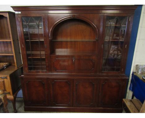 REPRODUCTION MAHOGANY FRAMED LIVING ROOM DISPLAY CABINET WITH CENTRAL ARCHED OPEN SHELF WITH DROP DRINKS CABINET FLANKED EITH