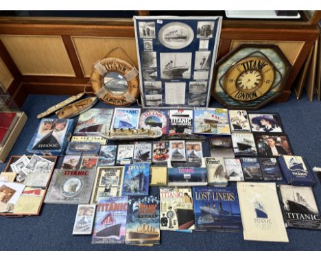 Collection of Titanic Memorabilia, to include replica porthole clock, montage of images of the Titanic, DVDs, models, picture