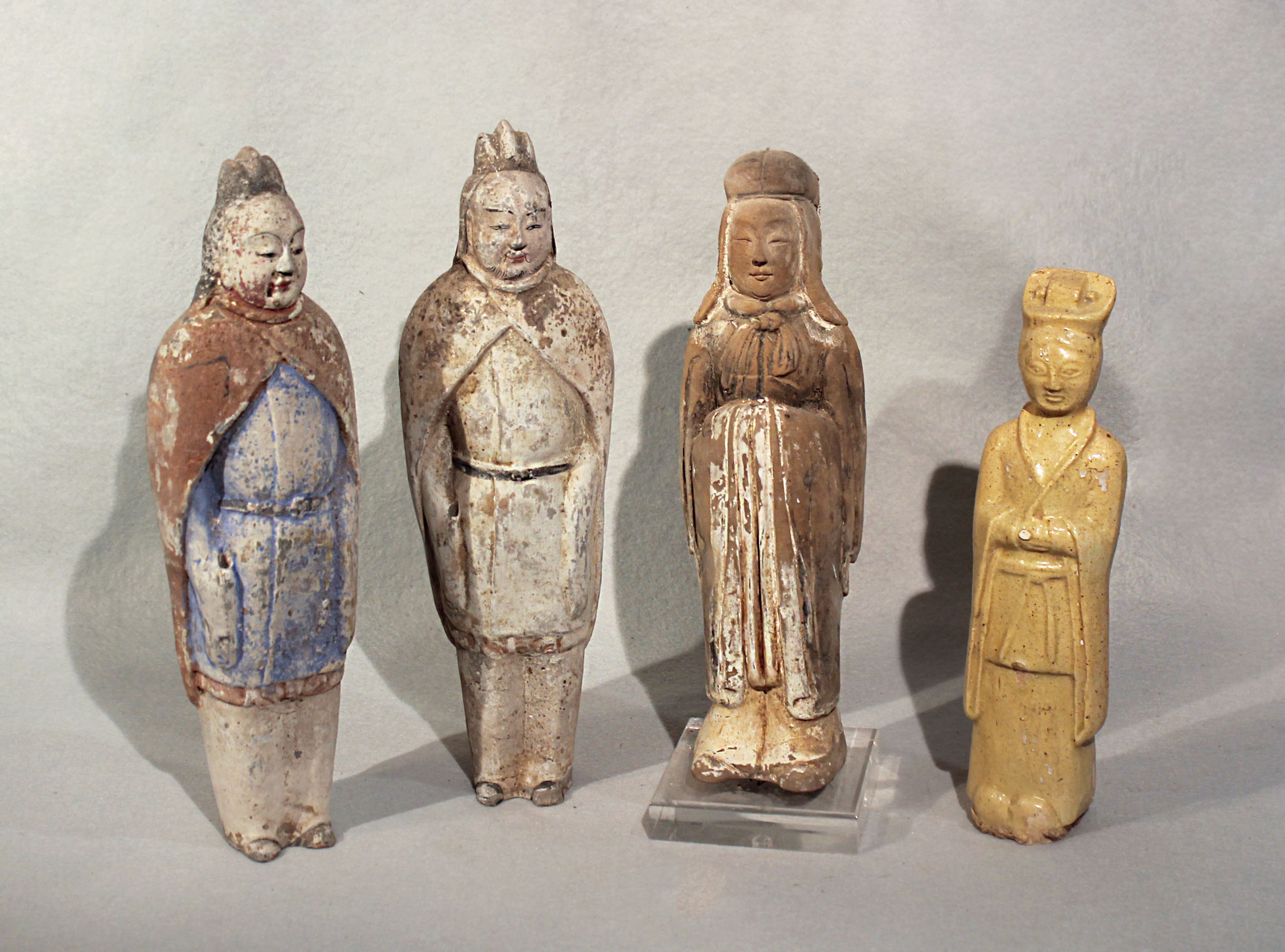 A group of four Chinese tomb figures, in - Cheffins Fine Art