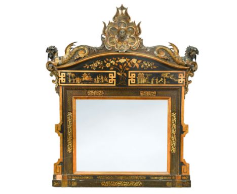 the arched pediment centred by a jutting Manchu gentleman's head, flanked by scroll-bodied moustachioed dragons, also with pe