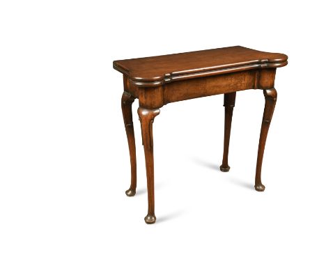 the flared top opening to reveal a baize lined playing surface, incorporating counter recesses, raised on cabriole legs and p