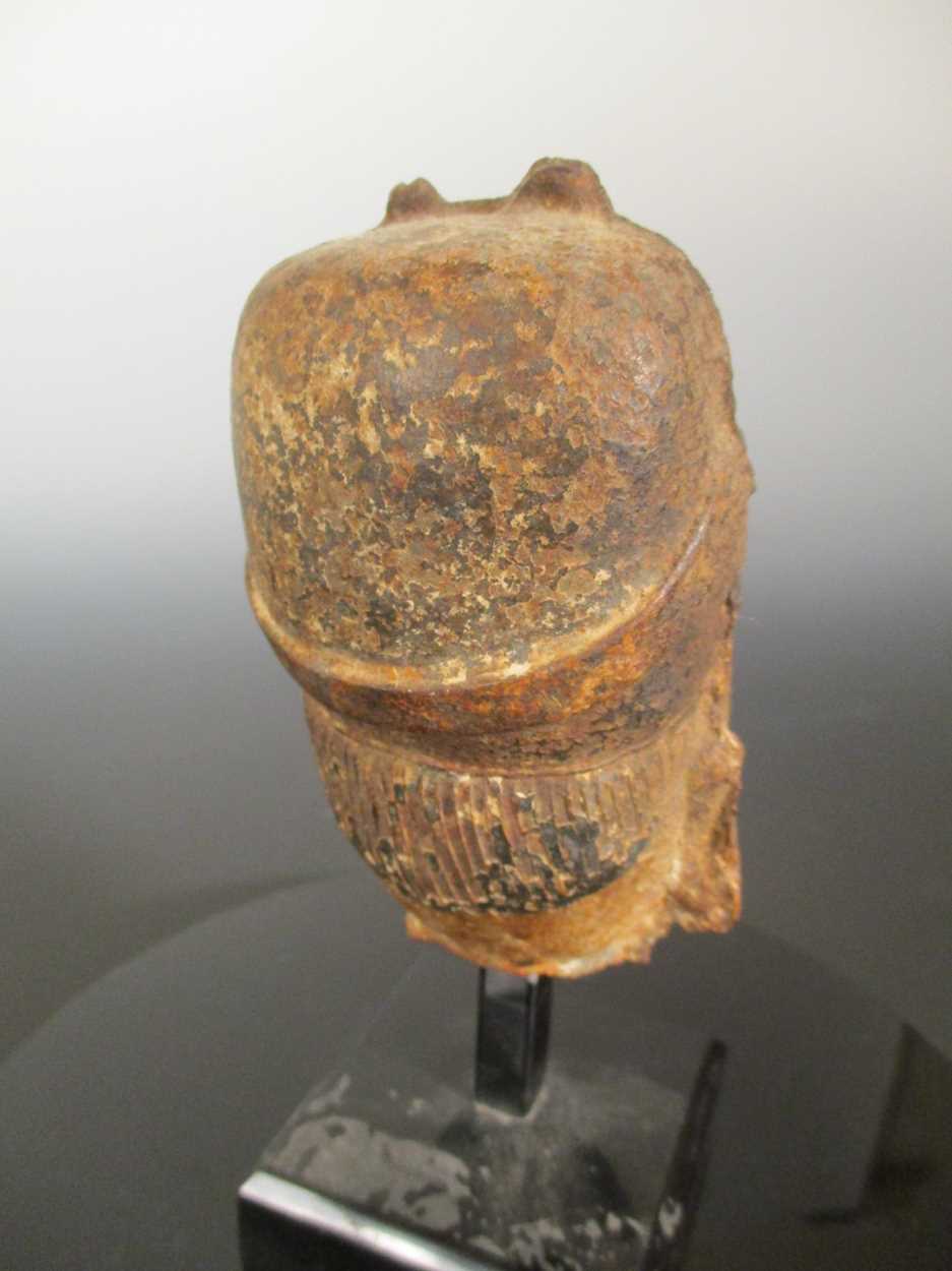 A Chinese cast iron head of an Official, probably late Ming Dynasty, in