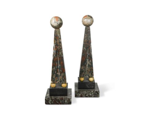 each surmounted with a ball finial and raised on four small balls and stepped base 40cm high (2)