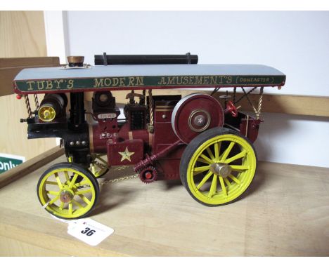 A Scratch Built Model of a Showman's Traction Engine, Burrel typle, 11inch long, 6inch high. Largely metal construction, fini