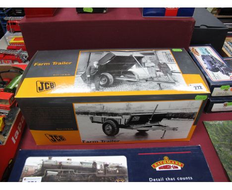 Boxed Universal Hobbies 1:16 Scale JCB Farm Trailer, No.UH2712. An exact model of the first J.C. Bamford product from 1945.