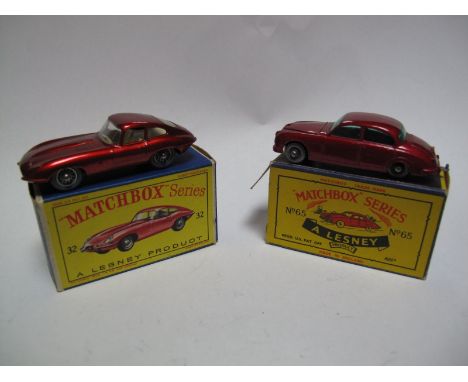 Two Boxed Matchbox 1-75's No.32 "E" Type Jaguar, grey plastic spoked wheels, small chips and rubbing to raised edges otherwis