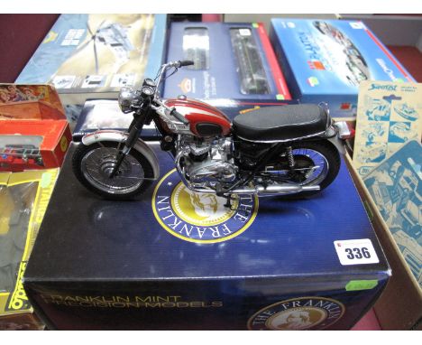 Boxed Franklin Mint 1:10 Scale Diecast "1969 Triumph Bonneville Motorcycle", in red with helmet and manuals.