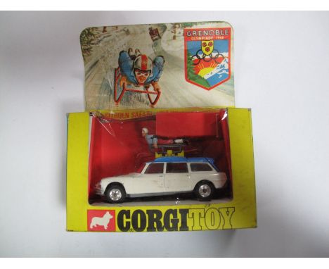 Original Boxed Corgi No. 499 Citroen Safari 1968 Winter Olympics, playworn but fair with toboggan, skier, figure and skis- no