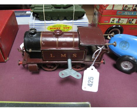 A 1930's Hornby "O" Gauge No.1 0-4-0 Locomotive, clockwork, finished in LMS, R/No. 2115, in overall good condition but missin