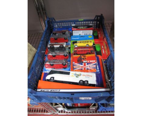 Twenty Four Boxed and Carded Modern Small Scale Diecast Buses, by Matchbox, Hot Wheels, Realtoy and others, including Matchbo