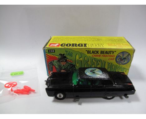 A Boxed Original Corgi No. 268 "Black Beauty" Green Hornet Crime Fighting Car, chipping to raised edges, missing gun and inst