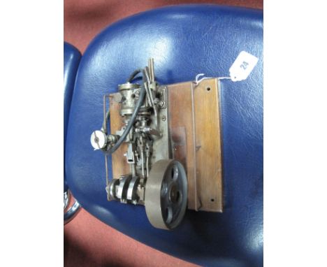 A Live Steam Model of a Horizontal "Mill" Type Engine, on wooden plinth, 8inch square, well engineered in steel and brass wit