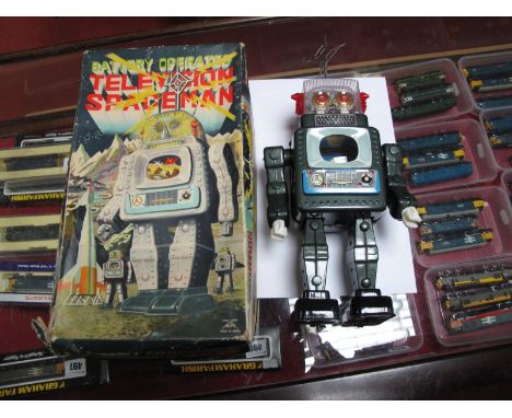 An Original Boxed 1960's Alps (Japan) Battery Operated Television Spaceman Robot, walking, spinning eyes, scrolling "T.V" in 