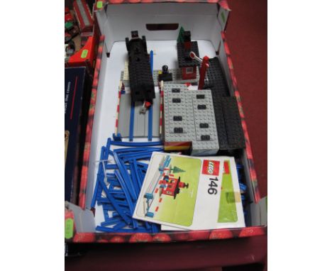 Vintage Lego Set 182 (1975) Train, with carriages, motor and track, and 146 Level Crossing (196), made up with instructions. 