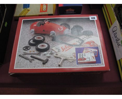 Boxed Schuco Re-issue Grand Prix 1075 Tin Plate Clockwork Racer, in presentation pack. Appears complete with key and tools/in