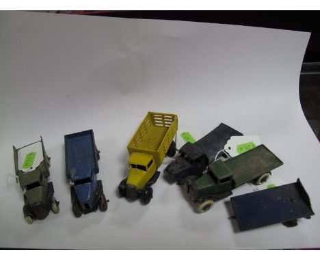 Five Pre-war Dinky Twenty Five Series Lorries. Grey tipping wagon, tailboard with "pins" present, missing headlamps; green fl