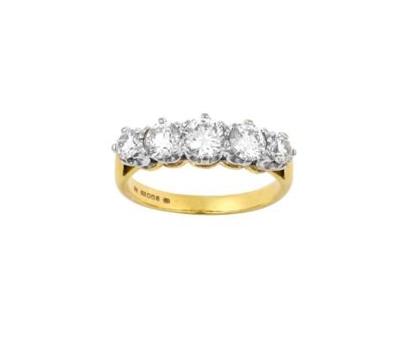 An 18 Carat Gold Diamond Five Stone Ringthe graduated round brilliant cut diamonds in white claw settings, to a yellow tapere