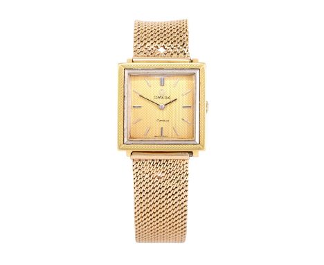 Omega: An 18 Carat Gold Wristwatch, signed Omega, Geneve, 1963, (calibre 620) manual wound lever movement signed and numbered