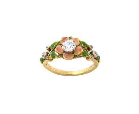 An Edwardian Enamel and Diamond Ringthe old cut diamond in a yellow claw setting, within a petal surround enamelled in pink a