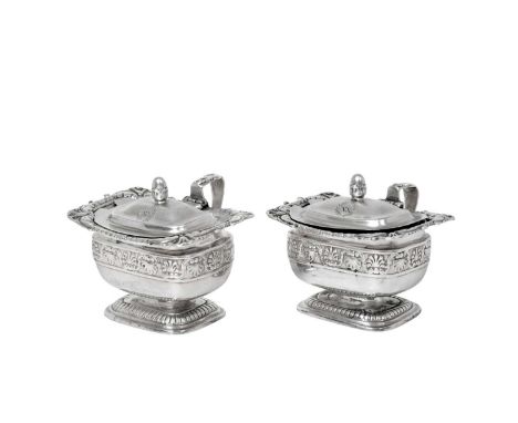 A Pair of George III Silver Mustard-Pots,  by Paul Storr, London, 1818 each oblong and on conforming lobed foot, the rim chas