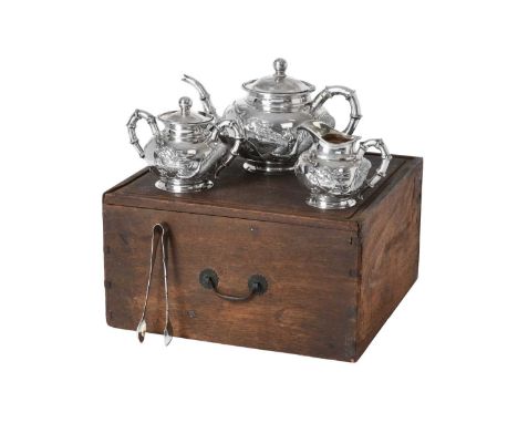 A Three-Piece Chinese Export Silver Tea-Service With a Pair of Sugar-Tongs En Suite,  Artisan Mark of De Long, Canton and Hon