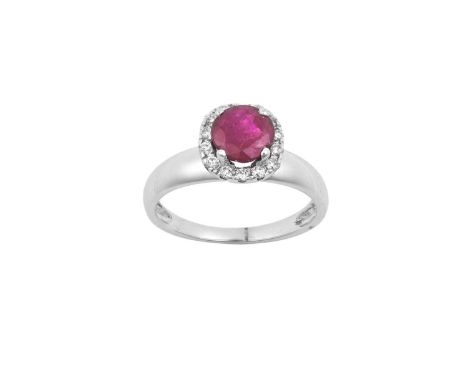 A Ruby and Diamond Cluster Ringthe round cut ruby within a border of round brilliant cut diamonds, in white claw settings, to