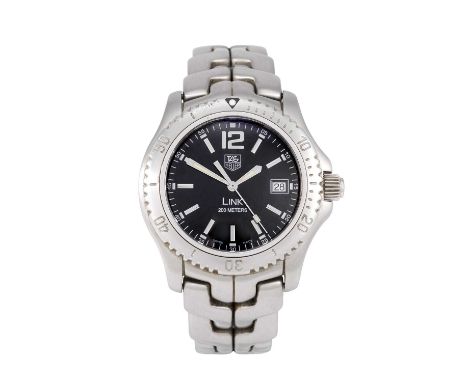 Tag Heuer: A Stainless Steel Calendar Centre Seconds Wristwatch, signed Tag Heuer, 200 meters model: Link, ref: WT1110-0, cir