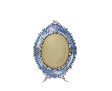 A Swiss Silver and Enamel Photograph-Frame,  by Ploujoux, Geneva, First Quarter 20th Century, Numbered 67024 shaped oval and 