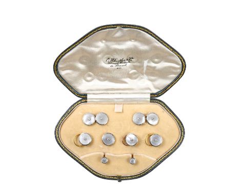 A Mother-of-Pearl and Diamond Button, Dress Stud and Cufflink Suitecomprising of four buttons, two studs and a pair of chain 