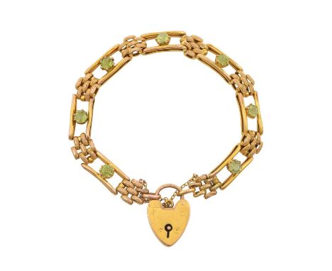 A Peridot Gate Link Braceletseven round cut peridots in yellow claw settings, set between plain polished bars, spaced by text