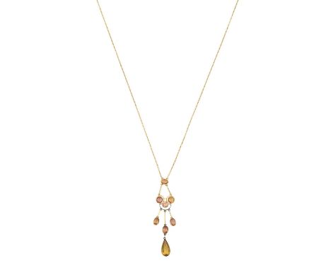 A Citrine and Topaz Necklacea single oval cut topaz, suspends a cluster of three round cut topaz, to three drops formed of ov