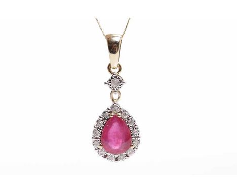RUBY AND DIAMOND PENDANT
the pear cut ruby measuring approximately 7.5mm x 5.5mm, surrounded by a row of brilliant cut diamon