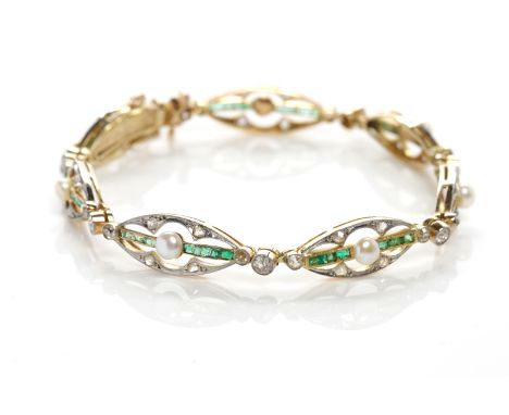 EDWARDIAN DIAMOND AND PEARL BRACELET
formed by elliptical openwork sections with a central pearl on an green gem set bar, wit