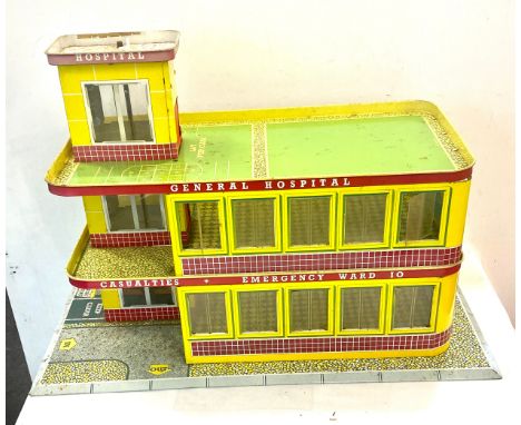 Vintage Mettoy children's general hospital tin building / garage, approximate measurements: Height 17 inches, Width 24.5 inch