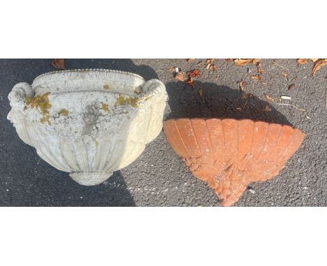 Two vintage wall hanging planters 