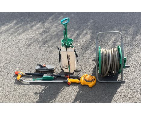 Selection of garden tools to include hose pipe on reel, sprayers etc 