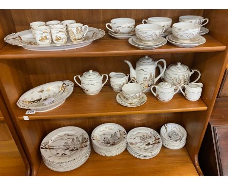 Oriental Lithophane Ware to include 6 coffee cups, milk jug, sugar pot, five tea cups 1 repaired, sugar basin and lid. Tea an