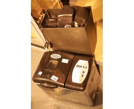 Morphy Richards stainless steel bread maker and a shredder. This lot is not available for in-house P&P.Condition Report: All 